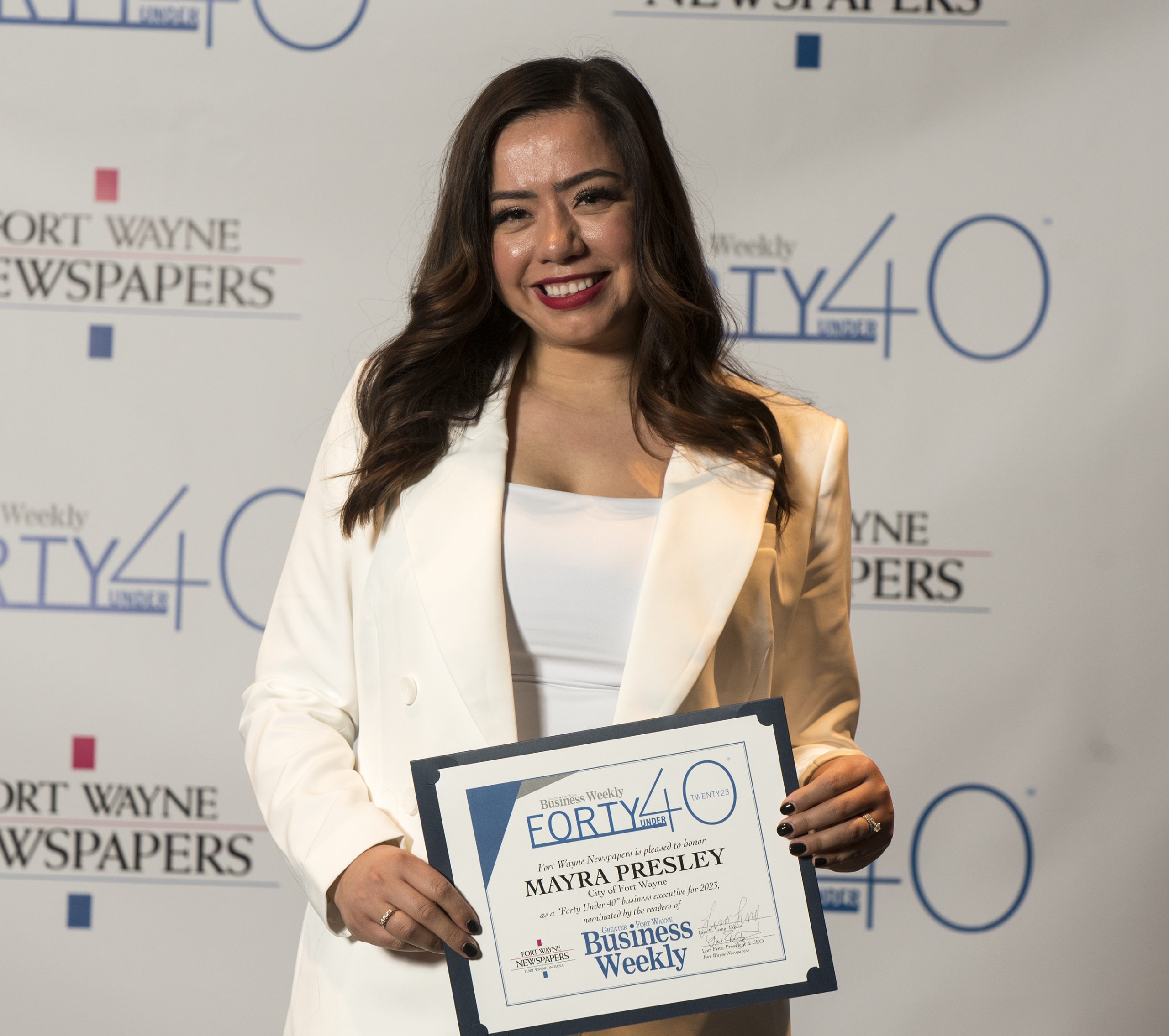 40u40-mayrapresley2